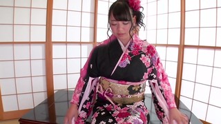 Asian babe in a kimono deepthroating a great manmeat